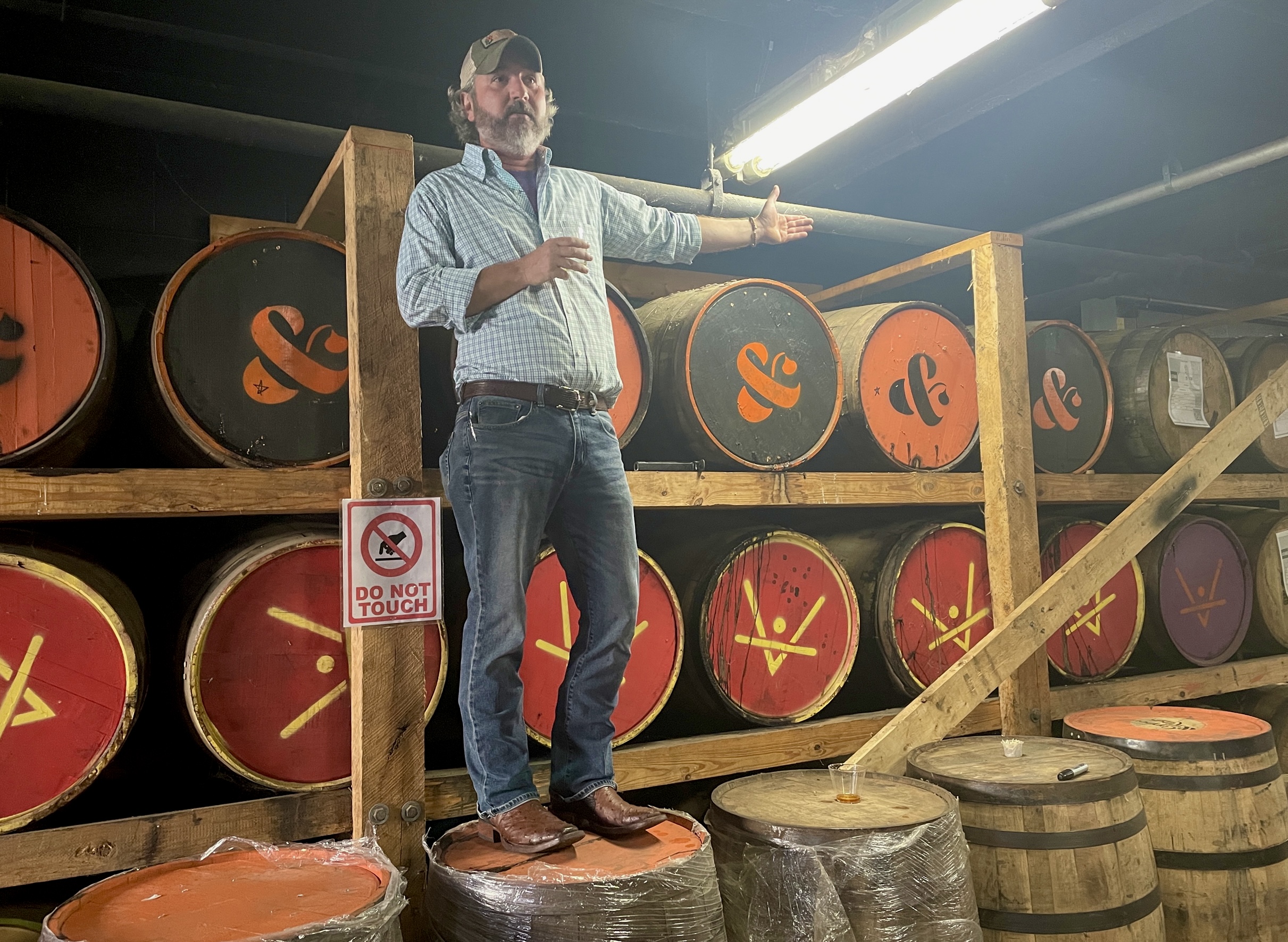 Master Distiller Brandon O'Daniel on barrels